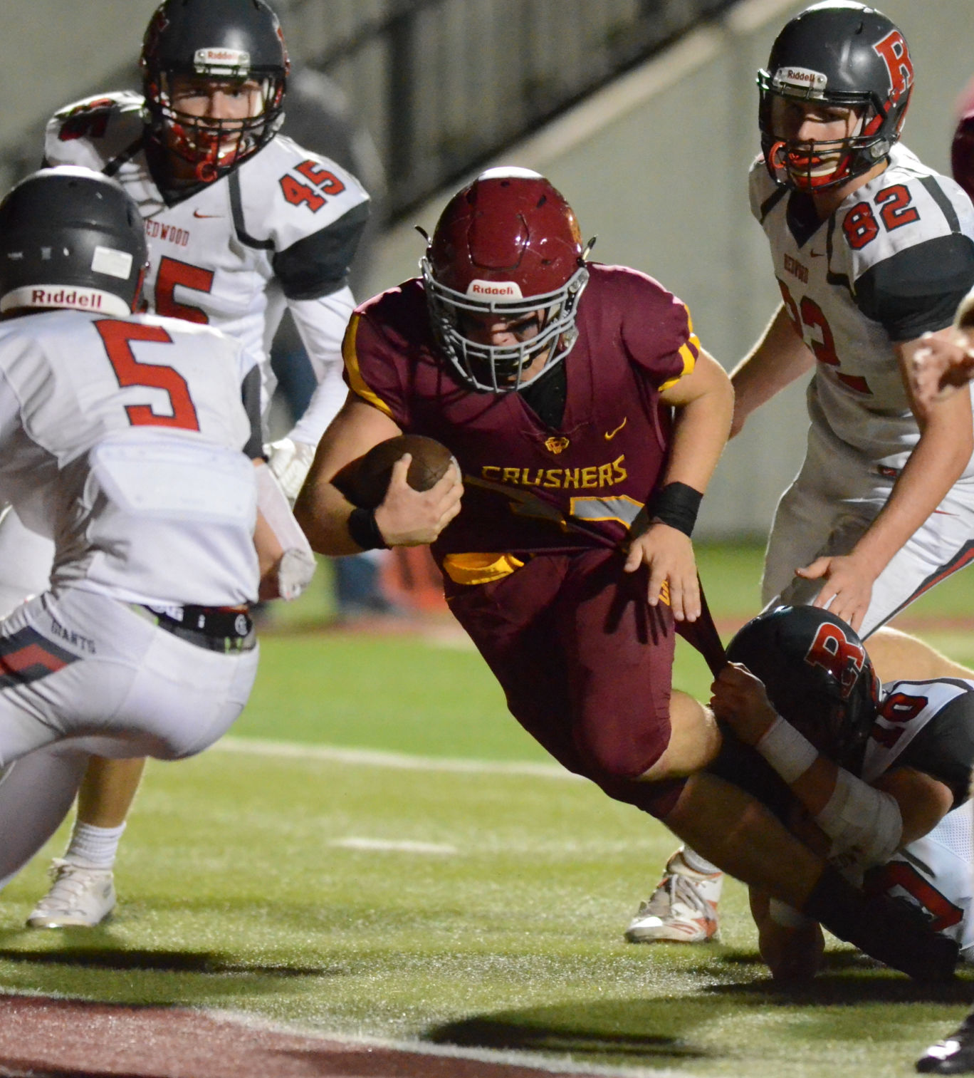 Vintage football vs. Redwood